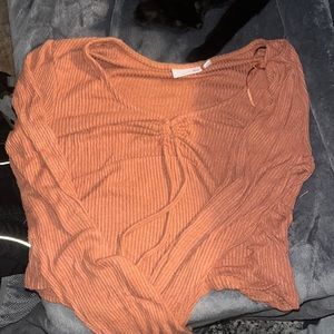 Soft, faint, orange, long sleeves